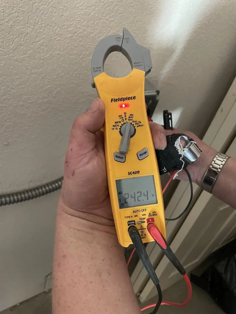 Voltage testing with clamp meter during Circuit Breaker Repair in Fallbrook